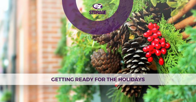 Further close-up of holiday wreath with EZ Storage logo and text "Getting Ready for the Holidays"