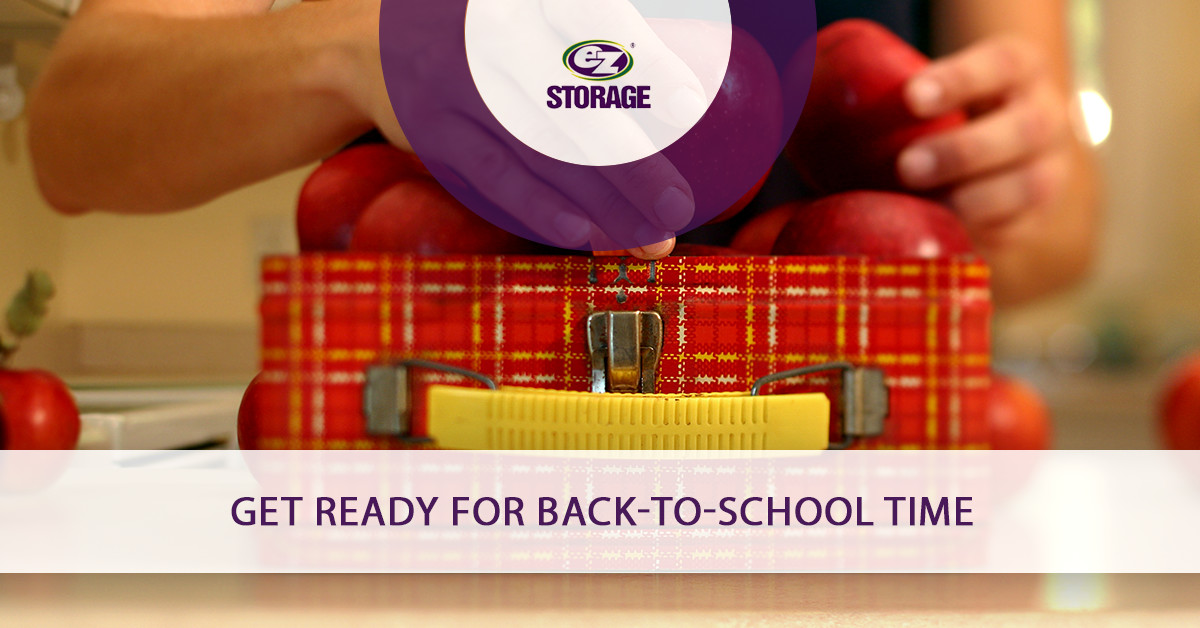 Person filling lunch box with apples and text "Get ready for back to school time"